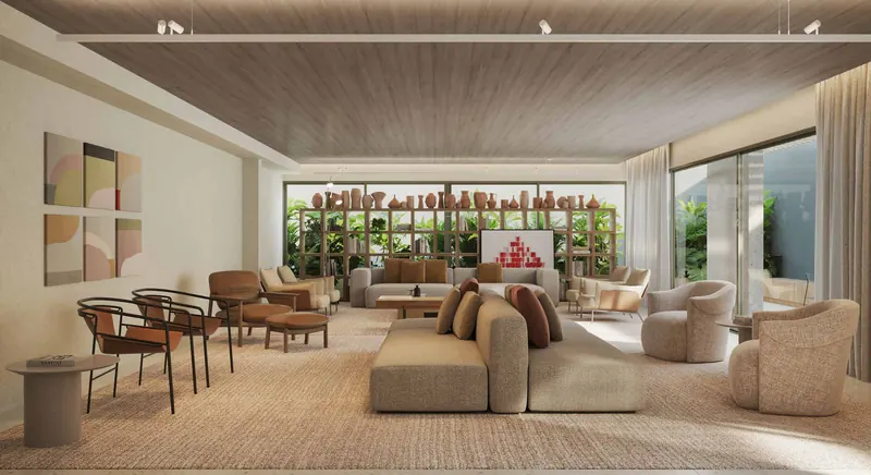 Espaço gourmet do Ipanema Almar com sofás, mesa de jantar e adega