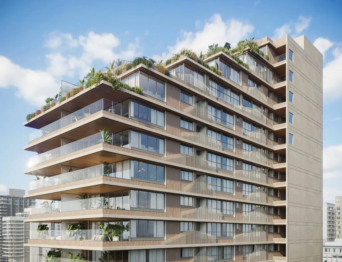 Fachada do Ipanema Almar com varandas em curvas suaves, jardins e vista para o mar de Ipanema